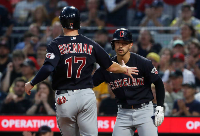 Jul 17, 2023; Pittsburgh, Pennsylvania, USA; Cleveland Guardians left fielder Steven Kwan (38) greets center fielder Will Brennan (17) as Brennan scores a run against the Pittsburgh Pirates during the fifth inning at PNC Park. Mandatory Credit: Charles LeClaire-USA TODAY Sports